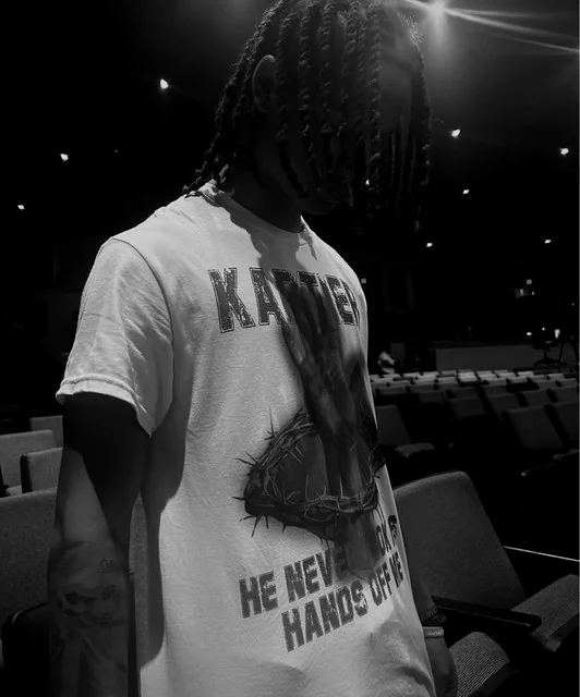 kpy.drew in a dark room, hair over his face